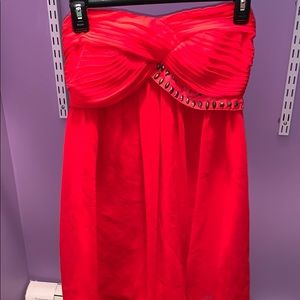 Red strapless mini dress